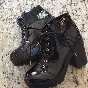 Black lace up boots, glossy, and barely used.